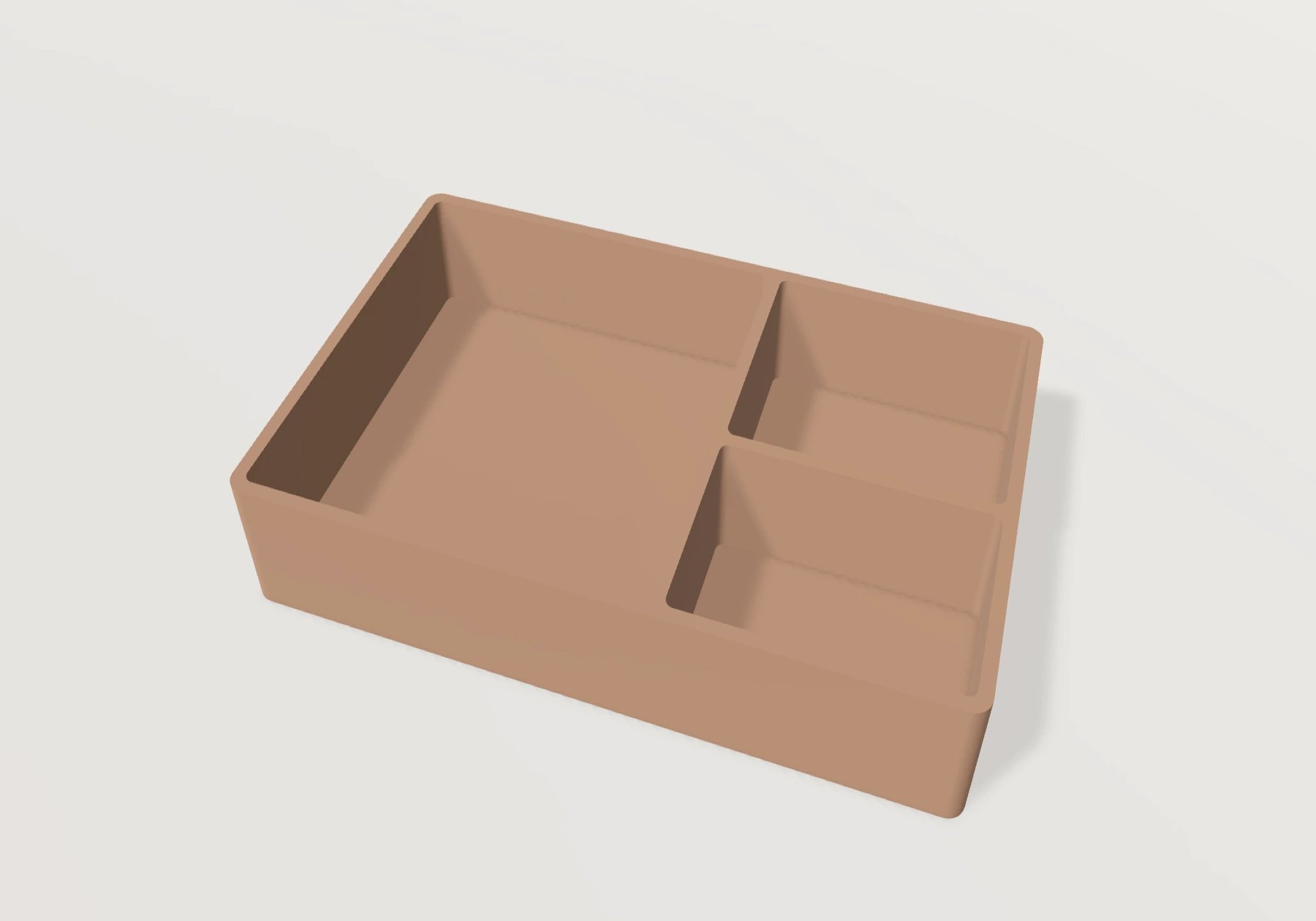 A clay-colored organizer tray with three compartments, rendered in the formuno app.